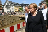 Angela Merkel et Armin Laschet visitent la ville de Bad Munstereifel, ravagée par la boue, en Allemagne le 20 juillet 2021