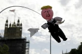 Marionnette représentant le Premier ministre britannique Boris Johnson, brandie par un manifestant près du Parlement, le 26 juin 2019