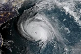 Cette photo du satellite NOAA/RAMMB prise le 12 septembre 2018 à 10H00 GMT montre l'ouragan Florence s'approcher des côtes américaines