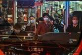 Des passagers dans un bus de Shanghaï, le 17 mars 2020