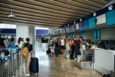 Des voyageurs au terminal 2 de l'aéroport d'Helsinki, le 19 août 2022 en Finlande