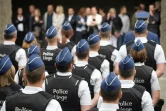 Des policiers participent à la cérémonie funèbre pour rendre hommage aux policières tuées à Liège, en Belgique, le 5 juin 2018