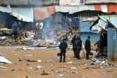 Des soldats en patrouille après des violences le 9 octobre 2015 à Conakry