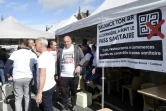 Des manifestants protestent contre l'obligation de présentation du pass sanitaire pour accéder aux restaurants, spectacles, cinémas...  à Cambrai le 7 août 2021