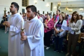 "A Lourdes, on peut mettre toutes nos souffrances ensemble, dans les mains de la Vierge", confie Bachar, un pélerin, à Lourdes, le 14 août 2018