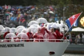 Le défilé de la délégation cubaine sur la Seine et sous la pluie lors de la cérémonie d'ouverture des Jeux de Paris, le 26 juillet 2024  