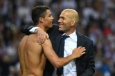 L'attaquant du Real Madrid Cristiano Ronaldo et son entraîneur Zinédine Zidane, après le succès en finale de la Ligue des champions, le 28 mai 2016 à San Siro