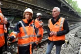 Guillaume Pepy, président de la SNCF, ici avec la présidente de la région Ile-de-France Valérie Pécresse le 4 juin 2016 à Paris, visitant les voies du RER C inondées par la Seine 