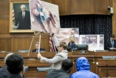 Présentation d'images de cadavres torturés par le régime syrien, devant un comité à Washington, le 31 juillet 2014