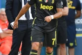 L'entraîneur de la Juventus, Massimiliano Allegri (g) et son attaquant Cristiano Ronaldo, lors du match de Serie A face au Chievo, à Vérone, le 18 août 2018