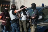 Des policiers des forces spéciales déployés à Münster (nord-ouest de l'Allemagne), le 7 avril 2018 après qu'une voiture a foncé dans la foule