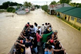 Une rue inondée le 18 décembre 2015 à Candaba aux Philippines