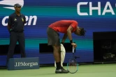 Gael Monfils se reprend après un long point contre l'Italien Matteo Berrettini, en quart de finale de l'US Open, le 4 septembre 2019 à New York.