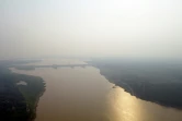 Vue aérienne de la ville de Porto Velho, au Brésil, couverte de fumée causée par les incendies qui ravagent la forêt amazonienne, le 2 septembre 2022