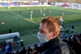 Match du derby de la capitale bélarusse entre le FC Minsk et le Dinamo Minsk, disputé le 28 mars 2020 avec des supporters équipés de masques de protection