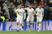 La joie de Cristiano Ronaldo (g) et ses coéquipiers du Real Madrid Karim Benzema (c) et Pepe, après un but du Portugais contre Wolfsburg, le 12 avril 2016 à Bernabeu