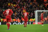 Les attaquants de Liverpool Sadio Mané (centre) et Mohamed Salah pendant le match contre l'Atletico Madrid à Liverpool le 11 mars 2020
