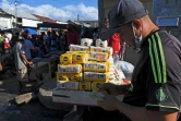 Un vendeur attend les clients sur un marché de Guiria, au Venezuela, le 19 décembre 2020