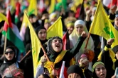 Des partisans du Hezbollah rassemblés pour regarder un discours télévisé de son chef Hassan Nasrallah dans la banlieue sud de Beyrouth, le 3 novembre 2023 au Liban