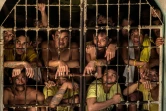 Des détenus entassés dans des cellules dans la prison surpeuplée de Quezon City, près de Manille, le 18 juillet 2016