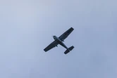 Un avion de la police anti-migrants survole la plage de Gravelines, lors d'une patrouille, le 29 août 2023 dans le Nord