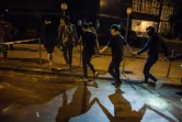 Six militants pro-démocratie ont abandonné dans la nuit le campus de l'Université Polytechnique de Hong Kong pour se rendre à la police, le 21 novembre 2019