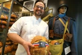 Christophe Guénard, dans sa boulangerie du centre-ville de Sedan (Ardennes) devant un mannequin de Poilu en tenue d'époque, le 6 avril 2018 