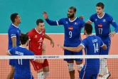 Les Français dont Earvin Ngapeth (c) se remotivent contre l'Italie en quart de finale du Mondial, le 7 septembre 2022 à Ljubljana