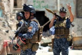 Des forces irakiennes lors de l'offensive pour reprendre la vieille ville de Mossoul aux jihadistes de l'EI, le 18 juin 2017