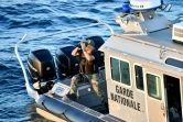 Un garde-côte tunisien lors d'une mission pour repérer des migrants en Méditerranée, le 10 août 2023