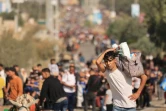 Des familles palestiniennes fuient à pied le nord de la bande de Gaza vers le sud, le 9 novembre 2023