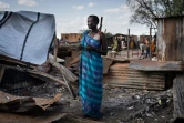 Une femme sur un marché incendié de Gumuruk, au Sud-Soudan, le 10 juin 2021