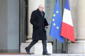 Le ministre de l'Intérieur Gérard Collomb quitte le palais de l'Elysée après un conseil des ministres, à Paris, le 14 février 2018