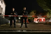 Des policiers montent la garde après l'attaque au couteau de Solingen, le 23 août 2024 dans l'ouest de l'Allemagne