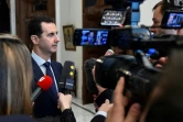 Le président syrien Bachar al-Assad face aux médias le 8 janvier 2017 à Damas 