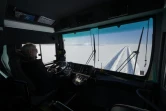 Astvaldur Oskarsson au volant de son bus géant qui parcourt le glacier de Langjökull, le 1et octobre 2020 en Islande


