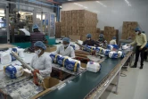 Des employés dans une usine à Sinnar, le 1er octobre 2020 en Inde