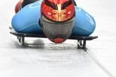 Le Chinois Zheng Yin en action dans l'épreuve de skeleton des Jeux de Pékin, le 10 février 2022 à Yanqing 