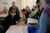 Le directeur de Charlie Hebdo Laurent Sourisseau, dit Riss, s'adresse à des lecteurs lors d'une rencontre publique à Strasbourg, le 2 novembre 2019