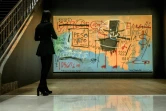 Une toile de Jean-Michel Basquiat, "the Guit of Gold Teeth", dans les locaux de Christie's, à New York, le 29 octobre 2021