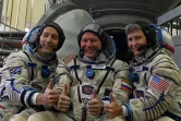 (De G à D) Thomas Pesquet, Oleg Novitsky et Peggy Whitson devant un Soyuz à la Cité des Etoiles, près de Moscou, le 25 octobre 2016