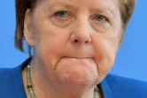 La chancelière allemande, Angela Merkel - ici le 11 mars 2020 à Berlin - a promis de faire "ce qui est nécessaire", quitte à revenir sur son dogme du zéro déficit