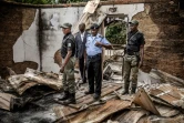 Des policiers nigérians patrouillent dans un village chrétien récemment attaqué par des assaillants, présumés Peuls, le 14 avril 2019.