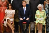 Meghan Markle, le prince Harry et la reine Elizabeth II à Bunckingham Palace, le 26 juin 2018.