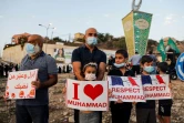 Manifestation d'Arabes israéliens musulmans, le 25 octobre 2020 à Umm-Al Fahem (nord d'Israël) après les propos du président français Emmanuel Macron sur l'islam qui ont suscité critiques, manifestations et même appels au boycott des produits français dans le monde musulman

