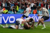Des joueurs anglais célèbrent leur victoire en demi-finale de l'Euro-2020 au stade londonien de Wembley