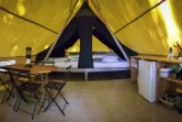 Vue panoramique de l'intérieur d'une tente au camging Huttopia, le 14 août 2019 à Sutton, au Canada
