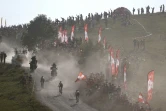 Les coureurs Marc Soler, Wout van Aert et Luis Leon Sanchez sur les pentes de la montée vers le plateau des Glières lors de la 18e étape, le 17 septembre 2020