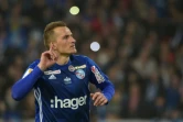 Le milieu de terrain de Strasbourg Dimitri Liénard après son penalty lors de la victoire aux tirs au but sur Guingamp en finale de la Coupe de la Ligue le 30 mars 2019
