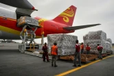 Déchargement de médicaments et de matériel médical d'un avion chinois à l'aéroport de Maiquetia, dans le nord du Venezuela, le 29 mars 2019